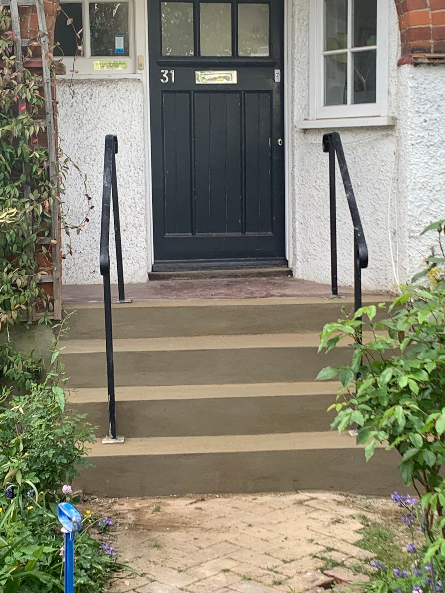 Rendered garden extension with patio, finished exterior